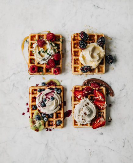 Waffles Topped with Brown Sugar Crème Fraîche and Blueberry Syrup